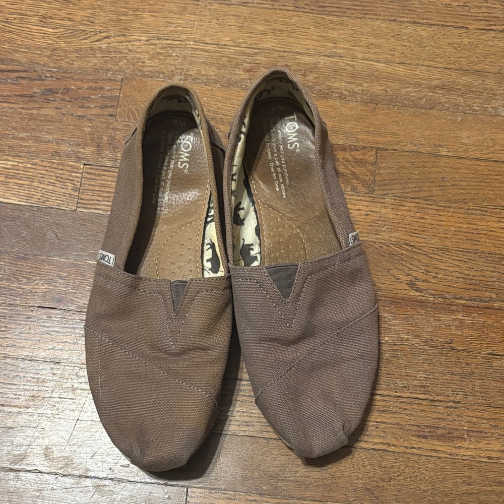TOMS women’s Grey Canvas Slip-Ons
